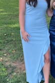 I bought this dress to wear as a wedding guest. It was comfortable and fit well, did not fall down during the night. The color is really pretty. I do think the fabric was a bit casual for the event, and I wasn't a huge fan of the slit. - Rikky J.
