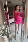 The dress is super cute but is not the best fit for a curvy girl. It would need some tailoring to fit an hourglass shape perfectly. It worked in a bind for a "shades of pink" bridal shower. - Sara W.
