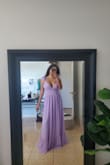 This dress is absolutely gorgeous! I have a quinceanera to attend this weekend and I couldn't be happier with how this dress turned out. I'm obsessed with the ruffle details on the shoulders and down the back, such a beautiful touch! I'm having the bottom hemmed slightly (as expected since I'm on the shorter side) and I'll also be adjusting the V-neck to make it less deep. Overall, this is my new favorite dress and I can't wait to wear it! - Deanna F.