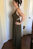 The dress is light and flowy, and the olive colour is darker than in the picture (which I was happier about!) The waistband is stretchy and overall the dress is flattering. If you don't have good posture the top part can sag a little in the front, but if you stand nice and tall with your shoulders back and it'll look great. Runs true to size. - Sam H.