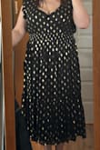 Love the dress. Had to get it altered slightly. The lady is going to open the seam at the shoulders and take them in. Was plugging a little too low for comfort. - Joelle R.