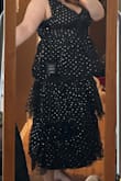 Really like this dress a lot. Taking it for alterations as the way it hung on me made the tiers not sit right. Getting the middle one shortened as the plain fabric was showing in between. Very low neckline. Looking for an insert as to not be too revealing. But it is sooo pretty. Pictures don't do it justice. - Joelle R.