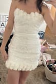This dress is so cute, was just a tiny bit small on me - Kelly H.