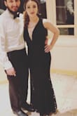 Bought this dress for a friends black tie wedding last weekend. Got a number of compliments on it!! I'm only 5 feet so I did have to get it hemmed quite a bit even with wearing approx. 3 inch heels. I also had to get the waist taken in,( I was going to buy an XS but after reading some of the reviews for this dress I decided to buy a size small) Being so petite I ALSO had to get the shoulder straps shortened about an inch. When I tried it on with a bra it was much too tight up top (glad I went with the Small after all) & smooched too much so I had the tailor sew in cups so I wouldn't have to wear a bra & it still pushed up my boobs just enough. This dress is an absolute staple! Perfect for any black tie or fancy event!! Just be aware if you are petite like me, you'll probably need to get it altered. - Iris B.