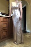 I was worried it would be too long or too tight. With my 5 inch heels the length is perfect. No stepping on the dress but can only see my toes while I walk. Dress all and all is stunning. - Kaylie R.