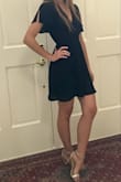 The length was ideal; short but not too short. The v-neck is low but the dress fit so well there was no gaping. The sleeves make it youthful and I'll get a lot of use from this little black dress! - Lynne V.
