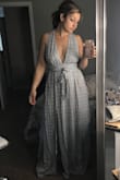 At first, I didn't realize why the ties at the neck were so long and I didn't like the way the dress looked. Once I looked back at the photo of the model and tied it correctly, I fell in love! I'm 5' tall and have large breasts. I don't have I wear a bra with this dress! It's about 1/2 inch too long when I wear 4" wedges, but otherwise it's so pretty. Very sexy but not over the top. - Laura W.