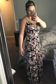 This dress is perfect for a summer event. The v in the front isn't low, so you can wear it to family events. I'm going to wear it to a graduation event. I had first got a small, but It was very firm fitting and the top was too small for my breasts. The medium had more give in the waist and fits my cheats perfectly. I have curves and it also hits all the imperfections. - Laura W.