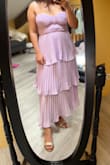 Thought it looked cuter in the photo than it did in person. Felt like the zipper was a bit low quality, and the bust area isn't padded or structured at all, so can be a little meh there, but otherwise cute.  Don't think I'd buy this again, though - Mohana B.