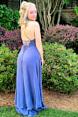Was a good dress for price, fit was true to size. Fabric thin/ light, and flowy. Be careful with any arm jewelry or clutch near it. By the end of night, there were over 8 picks/ thread runs across front of dress. Had hoped it could be worn again, but it may be a one and done dress due to the many noticeable runs that occurred after one night of wear. The back cross hatch straps are pretty, but are finicky to deal with. Take your time to adjust. - Brooke R.