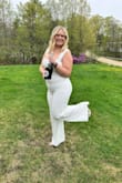 This jumpsuit was the perfect comfortable and stylish outfit choice for my college graduation. The material was soft and comfortable, and did not rub or irritate any areas. The material is high quality, and not see through for being white! I purchased a size Large, and it was true to size. I am 5'4 in height and about 184 pounds right now. I was very pleased with not only the quality of this outfit but how it made me look, which really brought confidence to my special day! - Hannah S.