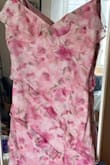 I love the color and style of this dress. It's beautiful. But like other reviews have mentioned, the material is very low quality, especially for the price of this dress. The quality of this dress does not match the price tag. - Kathleen S.