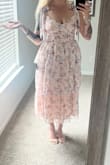 When looking at the reviews for this dress, it looked gorgeous on all the ladies, but I noticed each was quite petite, so I wanted to drop some photos for any taller/non-petite gals wondering if this dress would work for them! Measurements are 5'10", 185lb at the time of photos, and 39-33-44 if anyone is similar and wondering how it may look!

I love the dress, and as someone with a narrower waist and wider hips, it fits that body type well. The waist area is stretchy, so that's really nice, but as has been mentioned in other reviews, there's not a ton of cup room or support. If my boobs were any bigger at all it wouldn't fly lol. As it stands, I think it's gorgeous, feminine, and spring-timey and just perfect for a tea party this weekend! At 5'10" it's exactly tea-length.

The only issue I have with this dress is some mis-aligned stitching right in between the breasts. The right cup area isnt sewn perfectly so it looks a bit off-center but its not the end of the world. - Morgan P.