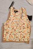 I have this same shirt in 2 other colors/patterns, but for some reason this multi-floral cream one is super small. My other 2 are extra small, but this one is sized way smaller and has zero stretch, so I exchanged for a medium. Overall absolutely love the top! - Rachel D.