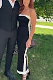 This dress fit perfectly and was very comfortable. The dress stayed up and in place for the bust,unlike some strapless dresses. It was perfect for the Kentucky Derby party we attended. - Debra D.