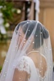 This was for my vow renewal (15 years later), so I didn't want to invest a lot of money in it. However, I was amazed by the results. I bought the dress and veil from Lulus, and I totally recommend it! - Zuly G.