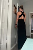 Ordered the medium and LOVED the cut, the style, and the quality. The bust area was a bit drafty. I've got what I think is an athletic build, with no boobs. I returned for a small, and that was a mistake. The bust fit but the lower half was clinging on for dear life (the slit went up a notch or two in height as well). I love the dress so much that I'm willing to deal with the draft in the chest. The photos are from the medium. - Dana C.