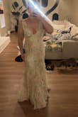 Ordered a size medium, and the chest area was way too big. Sizing down to a small, I think would be too tight, so I would have to get it altered to keep. Did not love the color in person. Too light for my skin tone. - Makayla L.