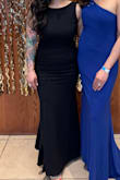 Loved it was the perfect dress for the occasion. The fit is great, just slightly large in the chest area, as there was a gap between my armpit and the dress aside from that, I bought the dress strictly on measurements, so the waist and hips fit perfectly. - Angela A.