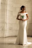 I ordered the Arienne White Off-the-Shoulder Mermaid Maxi Dress in size XS for my wedding, and it was absolutely everything I dreamed of and more. As the bride, I couldn't have been happier; from the moment I put it on, I knew it was the one. The material felt high-quality and elegant; the fit was flawless, and the off-the-shoulder design gave it such a romantic touch. The color was a beautiful, crisp white that looked stunning in photos and in person. - Veneesha R.