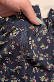 I was so excited to get this skirt! It is adorable! I love that it's lined and is not thin and see through. It fits true to size and is so flattering. Unfortunately, my second time wearing it, the front seem split apart spraying the material. It was almost like it was glued together and the glue separated. I think the material is good quality but the assembly needs improvement. - Ashley R.