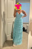 This dress fits like a glove!!! I was going back and forth between a small or XS, and ordered both. The only noticeable difference is the waist! The small gapped on me pretty badly, but the XS is perfect. If you have a smaller rib cage, sizing down may help! I'm 5'6" and with small heels (1.5") this dress is the perfect length. - Vanessa L.