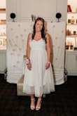 I absolutely adored this dress and felt so beautiful in it! I did have to get the straps altered to make them shorter. This helped because I am busty and wanted minimal cleavage. The seamstress also suggested hemming the white underlay and I would highly recommend that. I loved the look! - Ellen T.