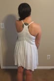 I got a Medium and it fits great. I haven't worn it yet but looks like it will be great. The straps are adjustable so it seems like if I shorten them enough I can wear a strapless bra. I don't remember it being too sheer. I thought it might tent, with my larger chest but it didn't really do that. It needs to be washed and dried and I'm sure the wrinkles will come out. - Sheryl C.