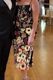 Loved this dress and got so many compliments. I didn't like how not all the flower petals were attached; it caused some of them to fold, but otherwise, everything was great. - Jennifer M.