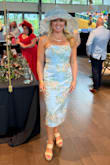 Loved the material and fit! The material is textured and has some stretch. Absolutely beautiful colors! I usually wear a size 4 dress. - Leslie H.