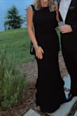 This dress fits perfectly. I received many compliments - Lexi T.