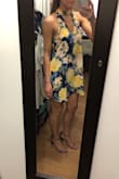 I loved this dress online but I was pretty indifferent when I tried it on. I ordered both a small and medium (small pictured) and didn't try on the medium. The colors aren't as vibrant in person and the arm holes go down further than expected. I was able to pull down the strap of my strapless bra to keep it from showing but if you wear your bra like normal it will definitely show. Besides that there wasn't anything wrong with the dress, it just didn't fit right. Unfortunately I ended up returning both sizes. - Kelsey S.