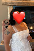 Pretty dress. Used this for my small city hall wedding. I sized up due to a larger bust. Glad I did. Did some minor adjustment to the straps and had it taken in at the top. Everyone loved it. A few of the flowers fell while wearing but nothing too noticeable. - Melissa R.