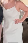Got this for my couple's shower and my bridal shower. It's very simple in a good way but has some buttons details which is so cute. I found it very flattering. I am a 36DDD and found the top of the L too small but the top of the XL too big, so I ended up using clothes pins on the XL and that worked great!! Super comfy!! - Claire D.