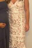 Super cute dress! If you are in between sizes, definitely size up. I'm typically between a medium and large and had to get the large and then have it taken in because there is 0 give to this dress. I got a ton of compliments though! - Samantha P.