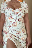 This is such a pretty dress. It's so flattering, comfortable and soft. I ordered an XL, and the dress fits me just right. I love the midi length, and it's not too revealing. I bought this for my daughter's baby shower, and I really think it's just perfect! - Kenric A.
