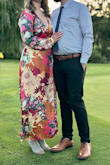 This dress is a showstopper! The vibrant floral pattern and flowing silhouette make it a standout piece for just about any occasion. I've worn it to weddings, birthday celebrations, and a night at the playhouse, and every time I receive compliments. The material is lightweight and packs beautifully without wrinkling, which makes it perfect for travel. The fit is flattering and comfortable, with a touch of elegance that works well for both daytime and evening events. It's become one of my go-to dresses, and I always feel confident and stylish in it. - Kaylan B.
