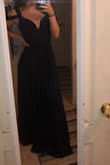 Fits really nicely, I did get the straps altered to be a little shorter. Pretty dress and looks really great - Lilly G.