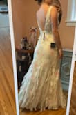 So loving the way the dress falls around my curves. With heels, the dress isn't too long. However, the straps are maybe built for someone with a wide chest. They want to slide off my shoulders. May need some tailoring - Amber P.