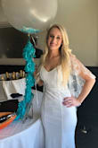 Stretchy material, super comfortable, fit perfectly, wore it for my bridal shower and got SO many compliments. - Emily W.