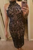 This dress is soooo soo beautiful. The material is amazing quailty and has a silk silhouette under the lace which makes it very comfy. Its not itchy or too thick. The lace is gorgeous and its slightly stretchy so you can move in it. Its just beautiful. The fit is great not too tight but not too loose either. You won't regret buying this dress! Treat yo'self!!! - Adrianna G.