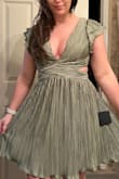 This dress is absolutely stunning. It fit me perfectly, and I did the size guide quiz, which helped me decide. Material is also great quality. - Anna S.
