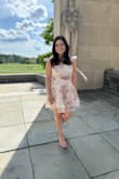 I bought this dress for my med school graduation, and it exceeded my expectations. Dress photographed well, and the fit was great, especially given the corset tie part, making it more adjustable. Only heads up I would give is that the dress was a bit scratchy after a few hours of wear. - Andrea D.