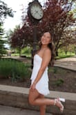 I really liked this dress, and I thought it stood out in comparison to the other grad dresses that I saw. The length could have been a little longer, so tall girlies watch out. I am 5'8 and I wore shorts under, and if I had not, it would have been bad. I ordered a medium, and glad I did since I think the small would have been too small and short. I love the open back!! - Julia H.