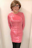 This is a sexy dress. It is a beautiful, pink color, hugs your curves, shows off your legs, and is also comfy. I'm not always a fan of sequins, but this dress does it right. And did I say that the pink color is gorgeous? Recommended. - Jo N.