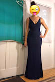 I got this dress in a large order of dresses to try for a black tie wedding. It looks pretty awesome on, definitely holds everything in and accentuates every curve in the best ways. Still can't decide if I'm keeping it because it's pretty tight but it's a definite contender. Also, I am wearing 4 inch heels and it's about half an inch from the ground. - Marianne K.