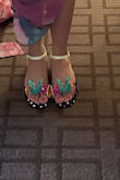 These sandals were bought for a wedding with the theme of colorful! They were such a hit. I'm a perfect 7.5 in heels and sometimes an 8 in sneakers, and they fit perfectly. I'm not a heel girly, but I was able to wear them all night and dance comfortably (even in the grass)! I would totally recommend these if you're thinking about it, and they're perfect for summer. Colors and the butterflies were exactly as pictured - Erin M.