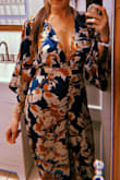 This is so sexy and comfortable! Felt like I was wearing a lavish robe all night long.
The elastic that latches to the button to hold the fit together, broke the 2nd time I wore it but.. I just wrapped/tied it around the button and it was fine. Got a LOT of compliments! - Deme R.