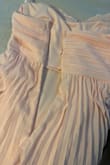 LOVED the way that this dress looked on me, but the zipper broke on the day of my prom. I was very distressed as I didn't have a backup option so my mother had to frantically sew me into my dress right before prom. - Soohee K.