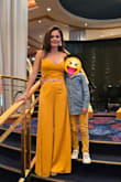 I absolutely loved how this two-piece set looked! I wore it for the "Dress to Impress" night during our cruise vacation. I usually have trouble finding pants that are long enough to wear with heels, but this one was just perfect with my tall wedges. The fabric is really nice and flatters my figure beautifully. I received so many compliments throughout the night! - Laura R.